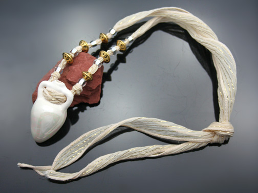 aromatherapy necklace on silk ribbon