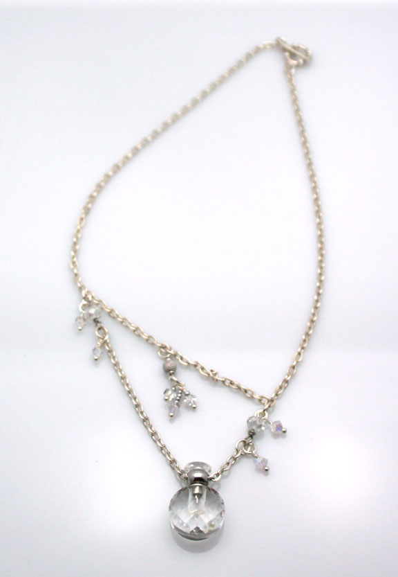 Aromatherapy necklace with a sterling silver chain, faceted mini glass bottle for your essential oils and beautiful crystal beads