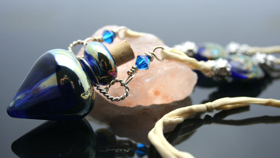 Deep water blue aromatherapy bottle necklace on a silk cord